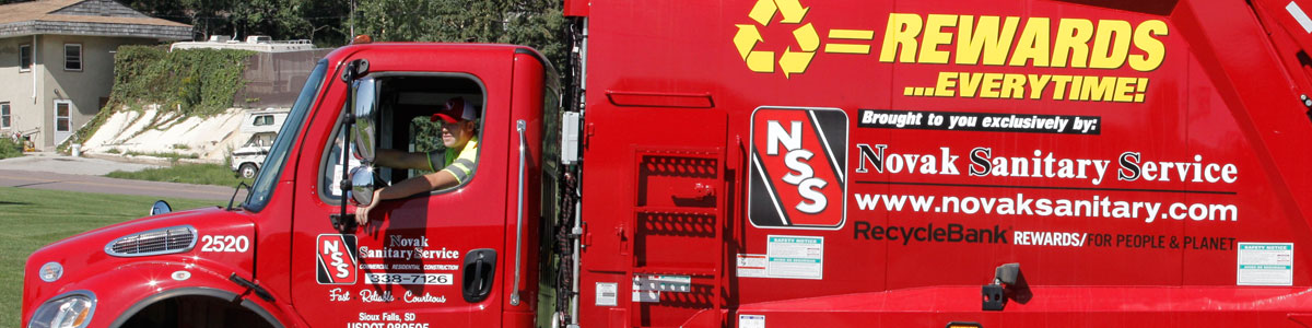 Photo of Novak Sanitary truck and driver in Davis, SD.
